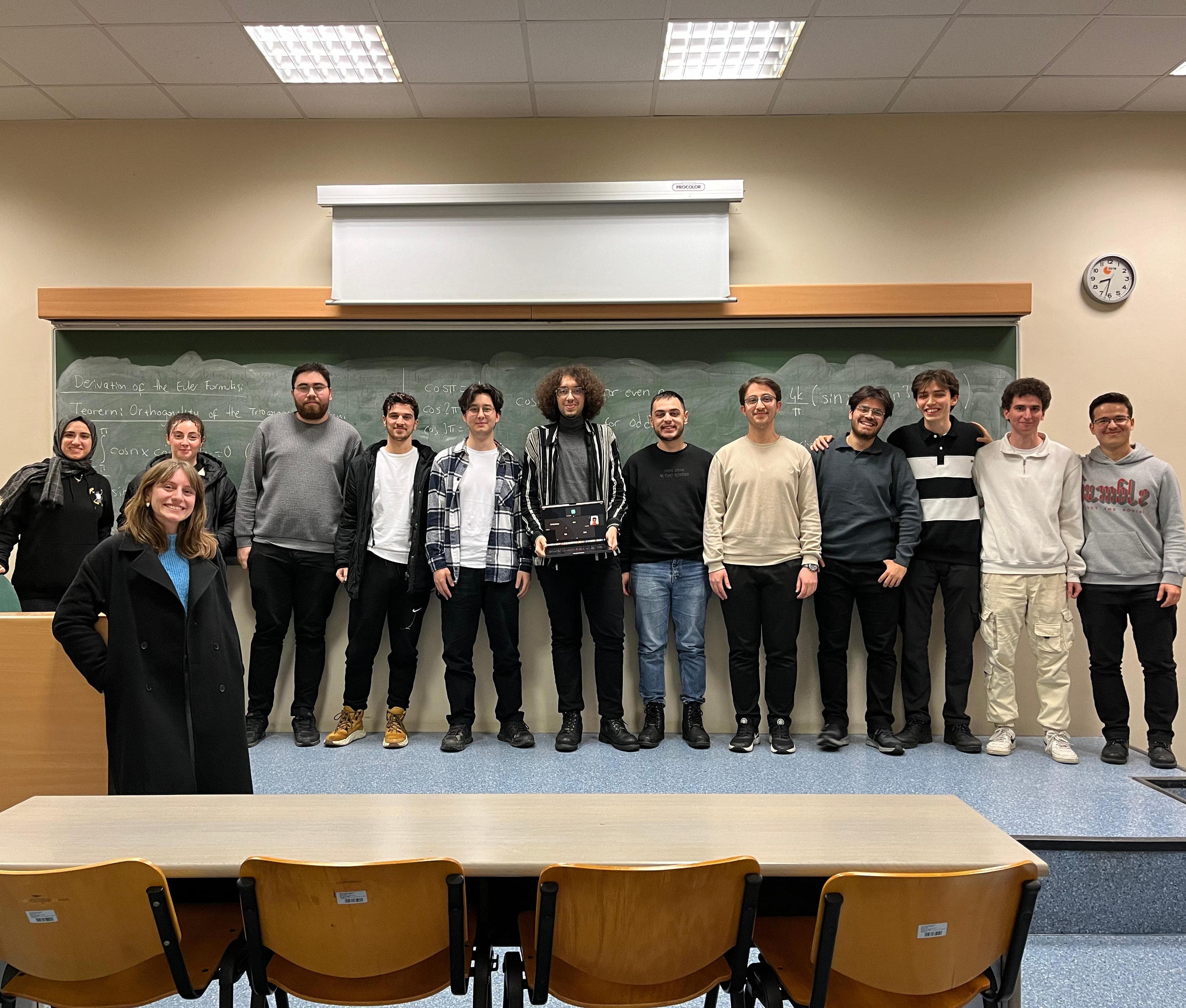 ITU Perceptron first physical meeting, group photo in front of blackboard