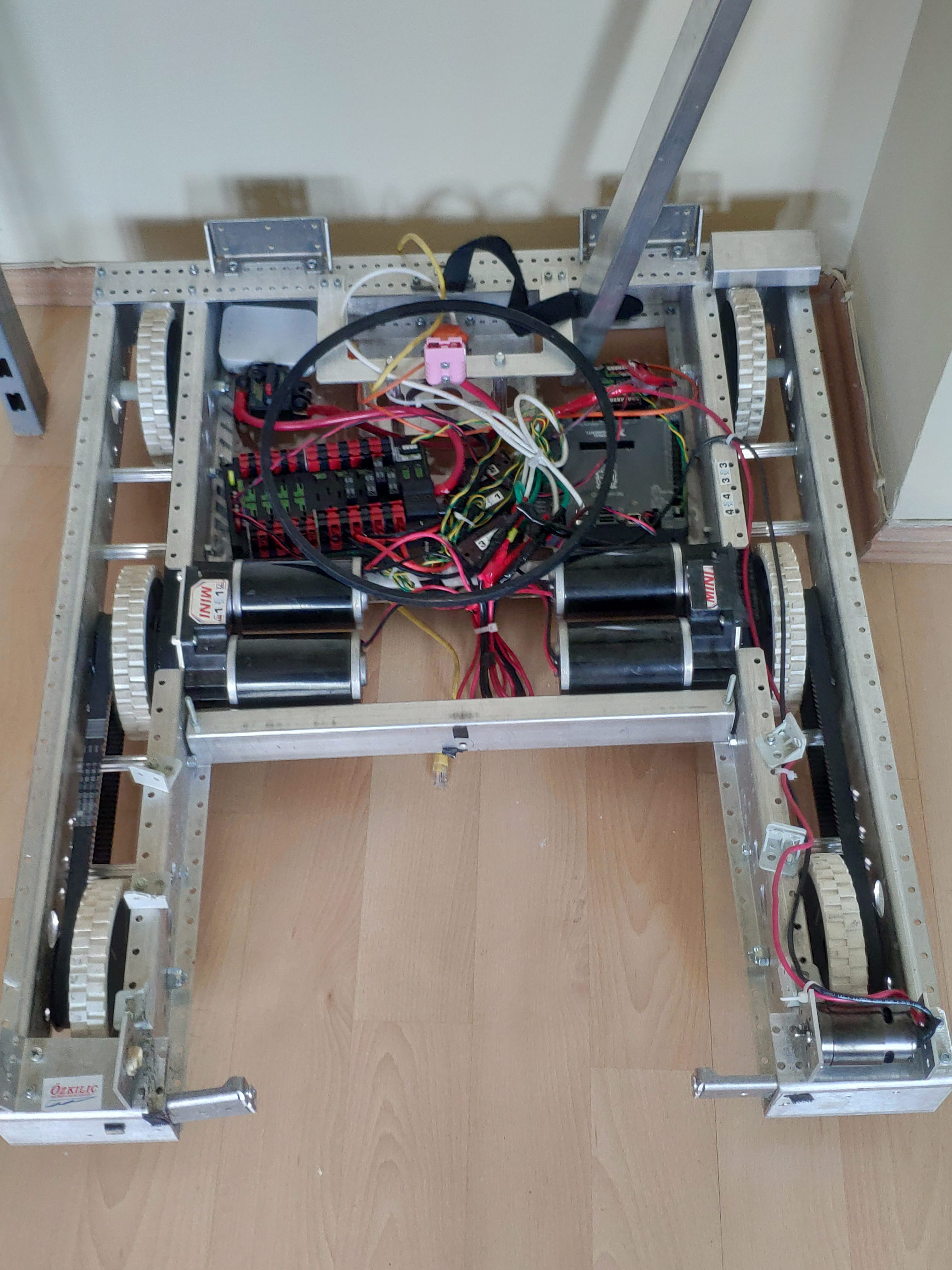 Initial FRC robot chassis on wooden floor