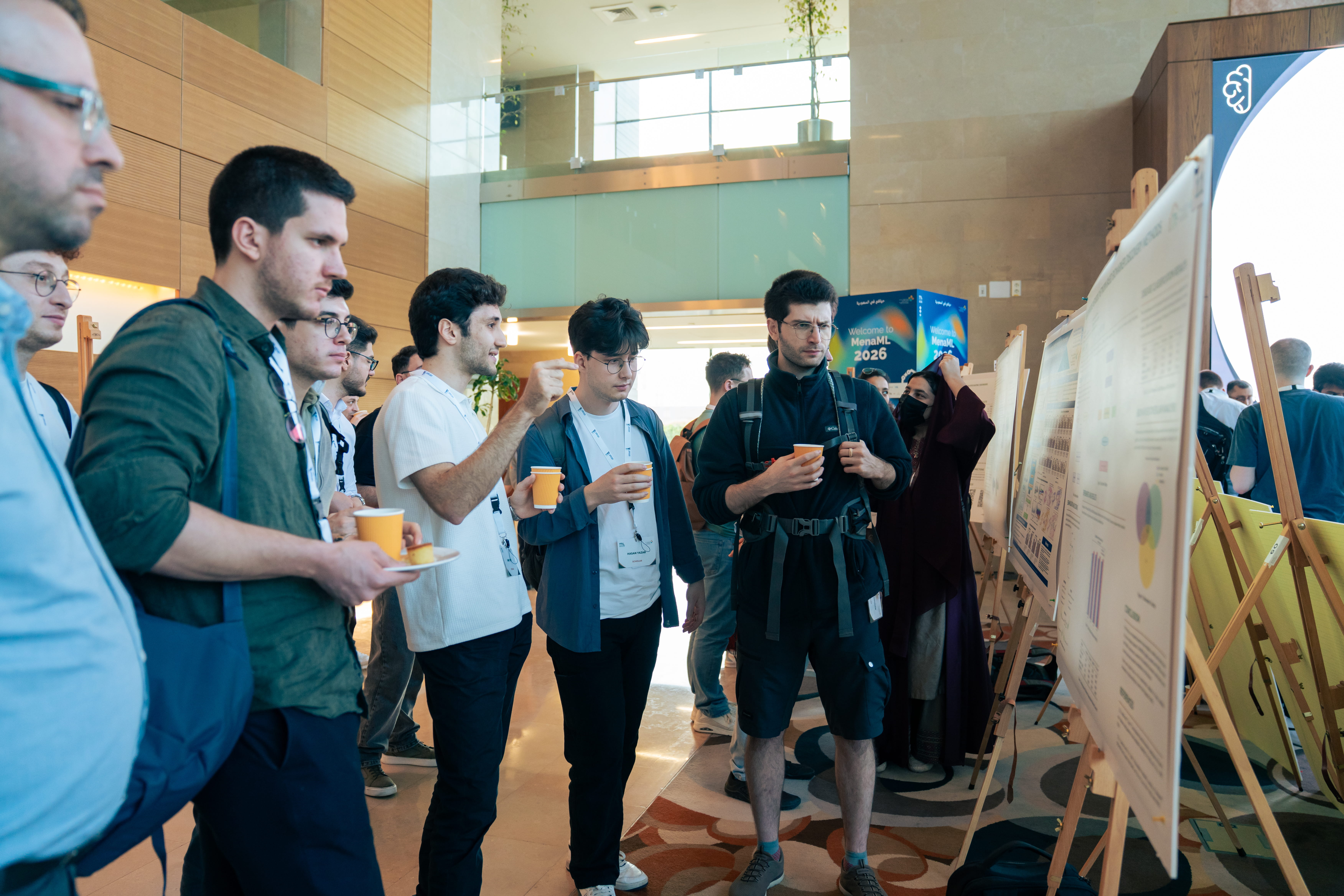 MenaML 2026 group photo on steps, Saudi Arabia