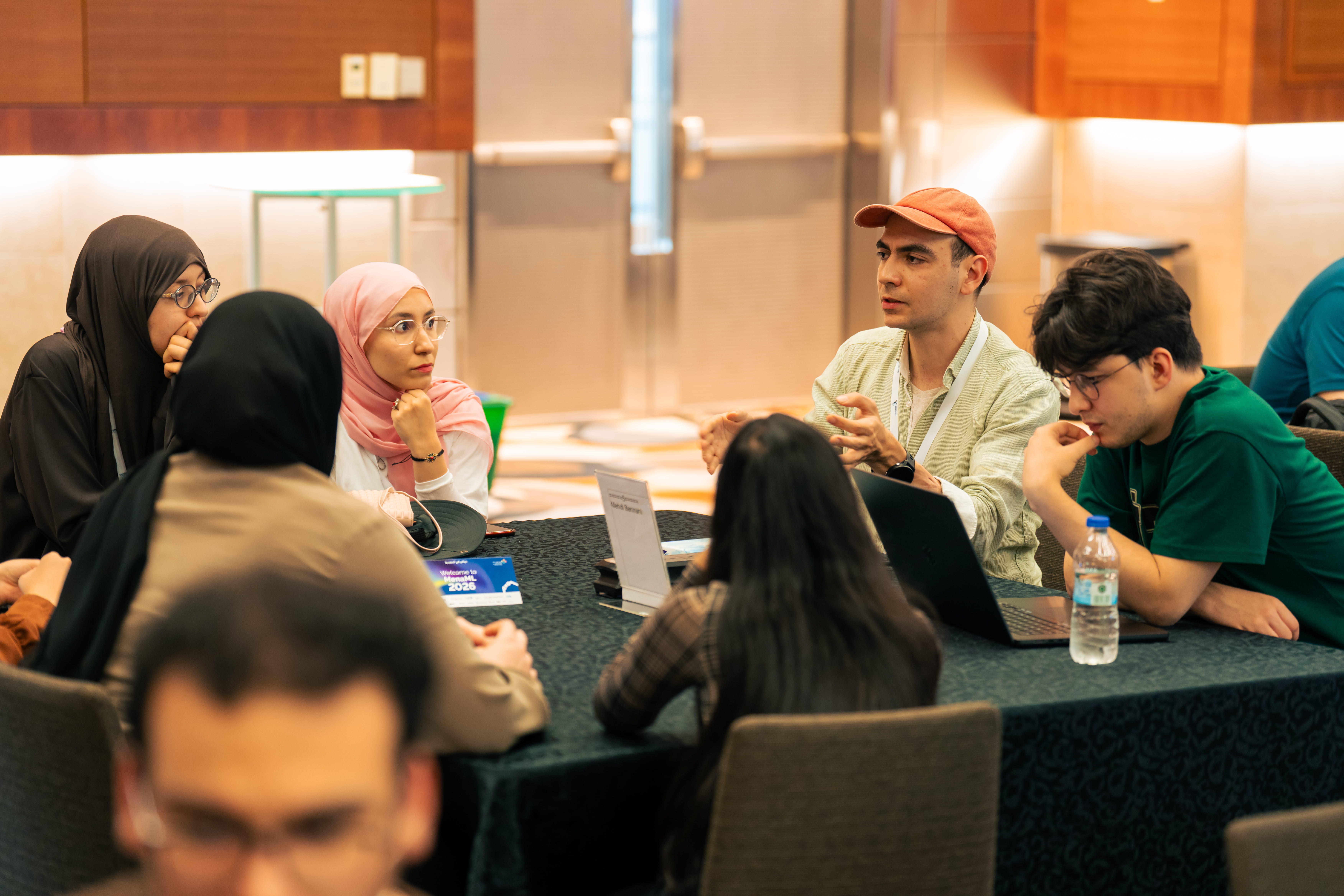 MenaML 2026 summit, discussion and Welcome to MenaML 2026 sign